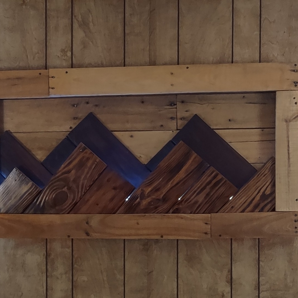 Backlit mountain range piece